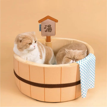 Funny cat bed mimicking a Japanese hot spring bath